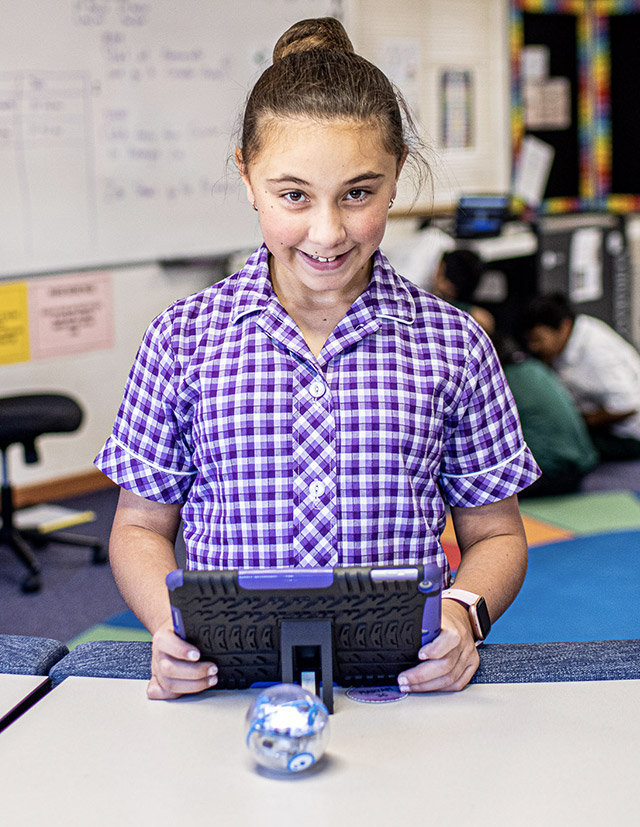 Girl coding at Holy Cross Catholic Primary Glenwood