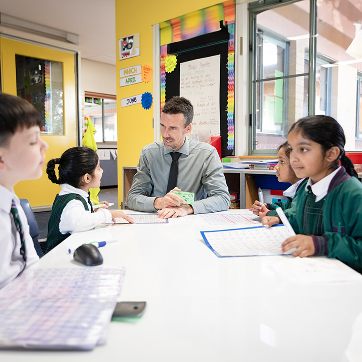 Holy Cross Catholic Primary Glenwood teacher with students in class
